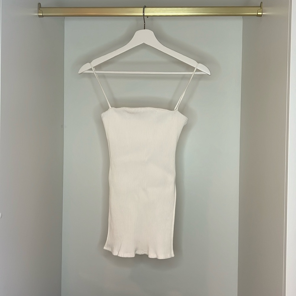 Ribbed spaghetti strap tank with side slits